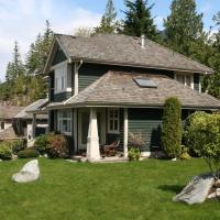 mountain house with green yard